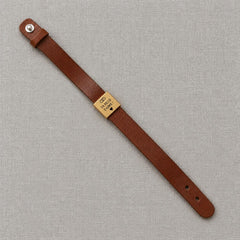 Bracelet marron déployé à plat